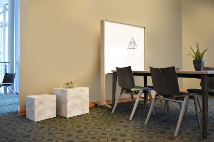 arvo table, quanta max chair, eliga whiteboard, GeoMetrix corian occasional table